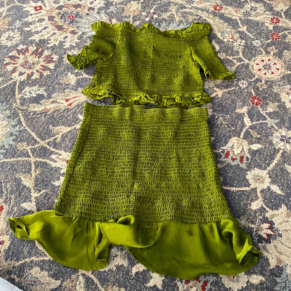 Green off the shoulder crop top and mini skirt set